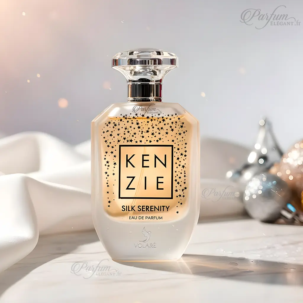 Kenzie – Silk Serenity (Eau de Parfum 100 ml) 3 Flacon Kenzie Silk Serenity posé sur tissu blanc avec reflets lumineux, parfum féminin doux et raffiné.